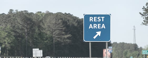 Blue roadside rest area sign